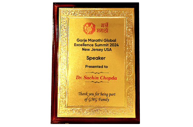 Garje Marathi Global Excellence Summit 2024 speaker plaque presented to Pushpam Infra
